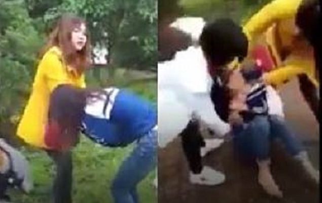 Nhóm phụ nữ lột đồ mặc cho nạn nhân van xin (ảnh cắt từ clip)