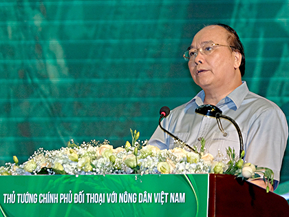 Thủ tướng Nguyễn Xuân Phúc phát biểu tại buổi đối thoại. Ảnh: QUANG HIẾU