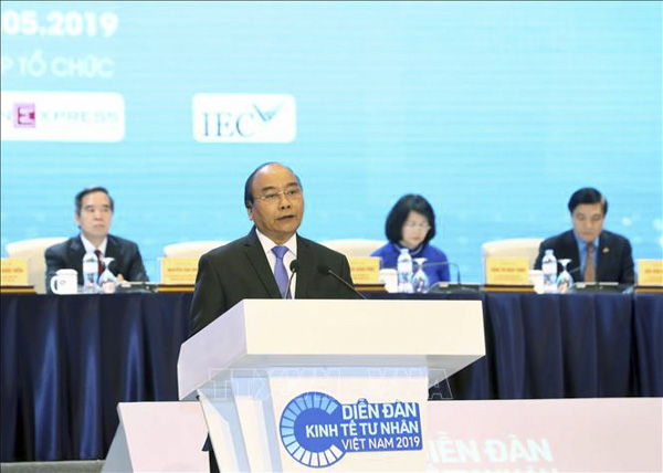 Thủ tướng Nguyễn Xuân Phúc phát biểu tại phiên toàn thể Diễn đàn Kinh tế tư nhân Việt Nam 2019.