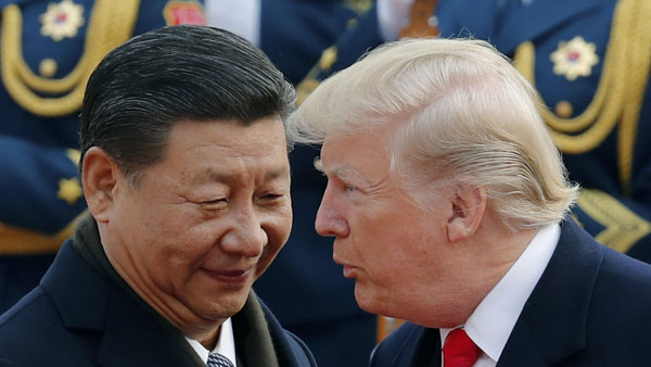 Chủ tịch Trung Quốc Tập Cận Bình (trái) và Tổng thống Mỹ Donald Trump trong một cuộc gặp ở Bắc Kinh tháng 11-2017. 