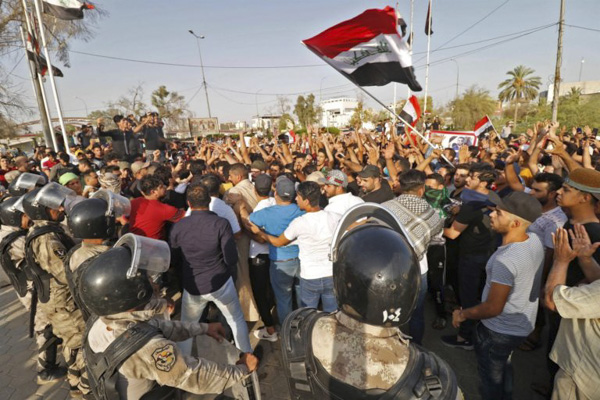  Làn sóng biểu tình đang tiếp diễn tại Iraq. (Ảnh: AFP)