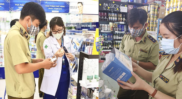 Cán bộ Đội QLTT số 2 kiểm tra các mặt hàng vật tư y tế (nước sát khuẩn, khẩu trang) phòng chống dịch COVID-19 tại một cửa hàng ở Phường 1, TP.Vũng Tàu.