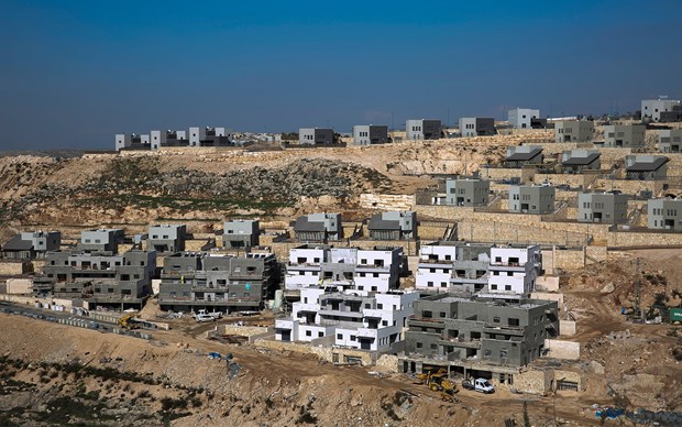 Israel tạm dừng tuyên bố chủ quyền ở các khu định cư Bờ Tây.