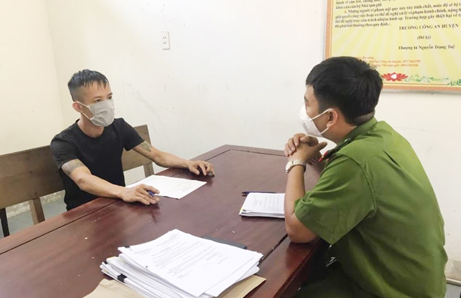 Hồ Xuân Lộc tại cơ quan Công an.
