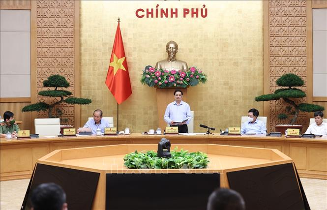 Thủ tướng Chính phủ Phạm Minh Chính phát biểu tại cuộc họp của Chính phủ với Ban Chỉ đạo Quốc gia phòng, chống COVID-19. Ảnh: TTXVN