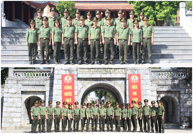 Đồng chí Thượng tá Trần Ngọc Tuấn, Phó Giám đốc Công an tỉnh và đoàn đại biểu Phòng Tham mưu chụp ảnh lưu niệm tại Nghĩa trang liệt sĩ quốc tế Việt - Lào