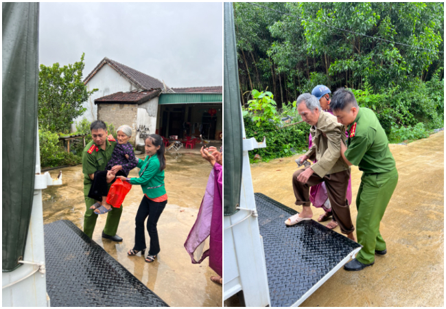 Công an tại huyện Anh Sơn dùng xe chuyên dụng hỗ trợ người dân đi chuyển ra khỏi vùng nguy hiểm
