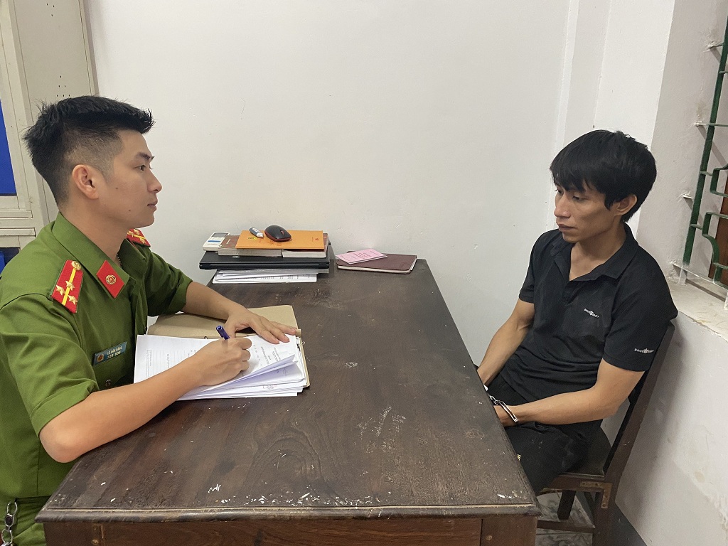 Đối tượng Cao Xuân Hoàng tại cơ quan Công an