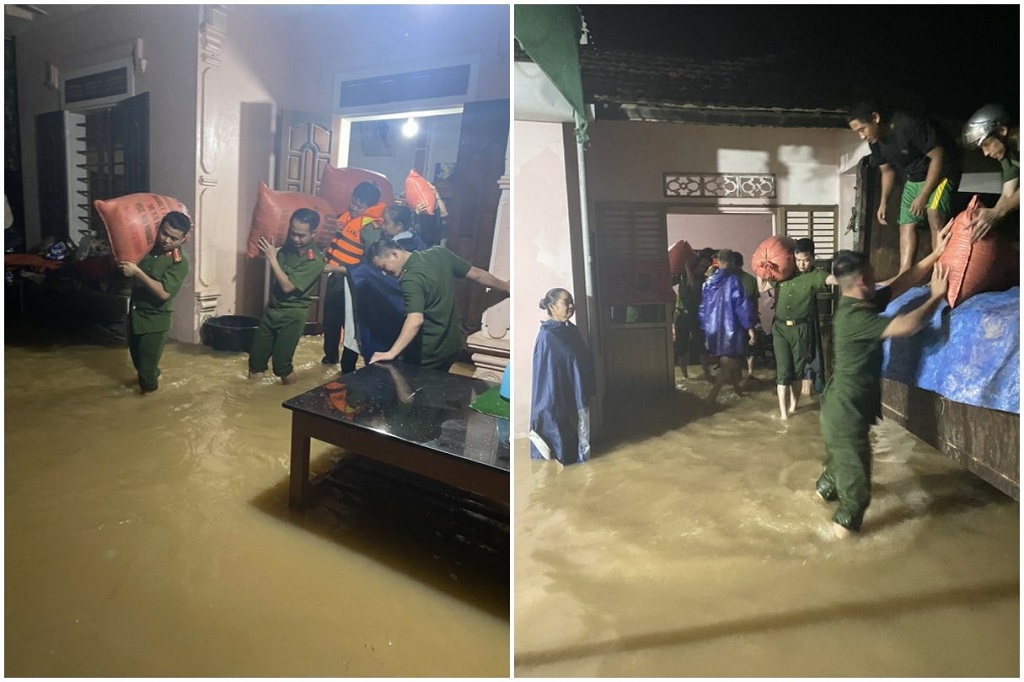 Cán bộ, chiến sĩ Công an thị xã Thái Hòa giúp đỡ Nhân dân di dời tài sản có nguy cơ bị ngập lụt trong đêm 29/9/2022 đến khu vực cao ráo