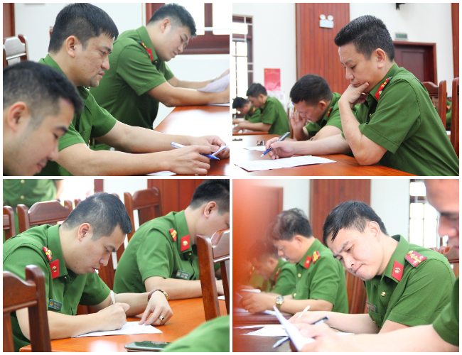 Cán bộ, chiến sĩ tập trung trả lời câu hỏi mà Ban tổ chức đưa ra