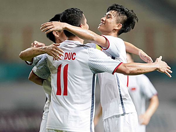 Niềm vui của các cầu thủ U23 Việt Nam trong trận thắng Nhật Bản 1-0.
