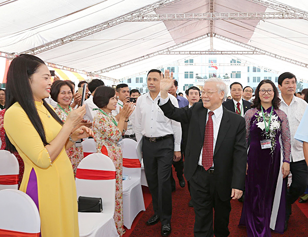 Tổng Bí thư Nguyễn Phú Trọng, các đồng chí lãnh đạo Đảng, Nhà nước, các bộ, ban, ngành Trung ương đến dự lễ khai giảng. Ảnh: Trí Dũng 