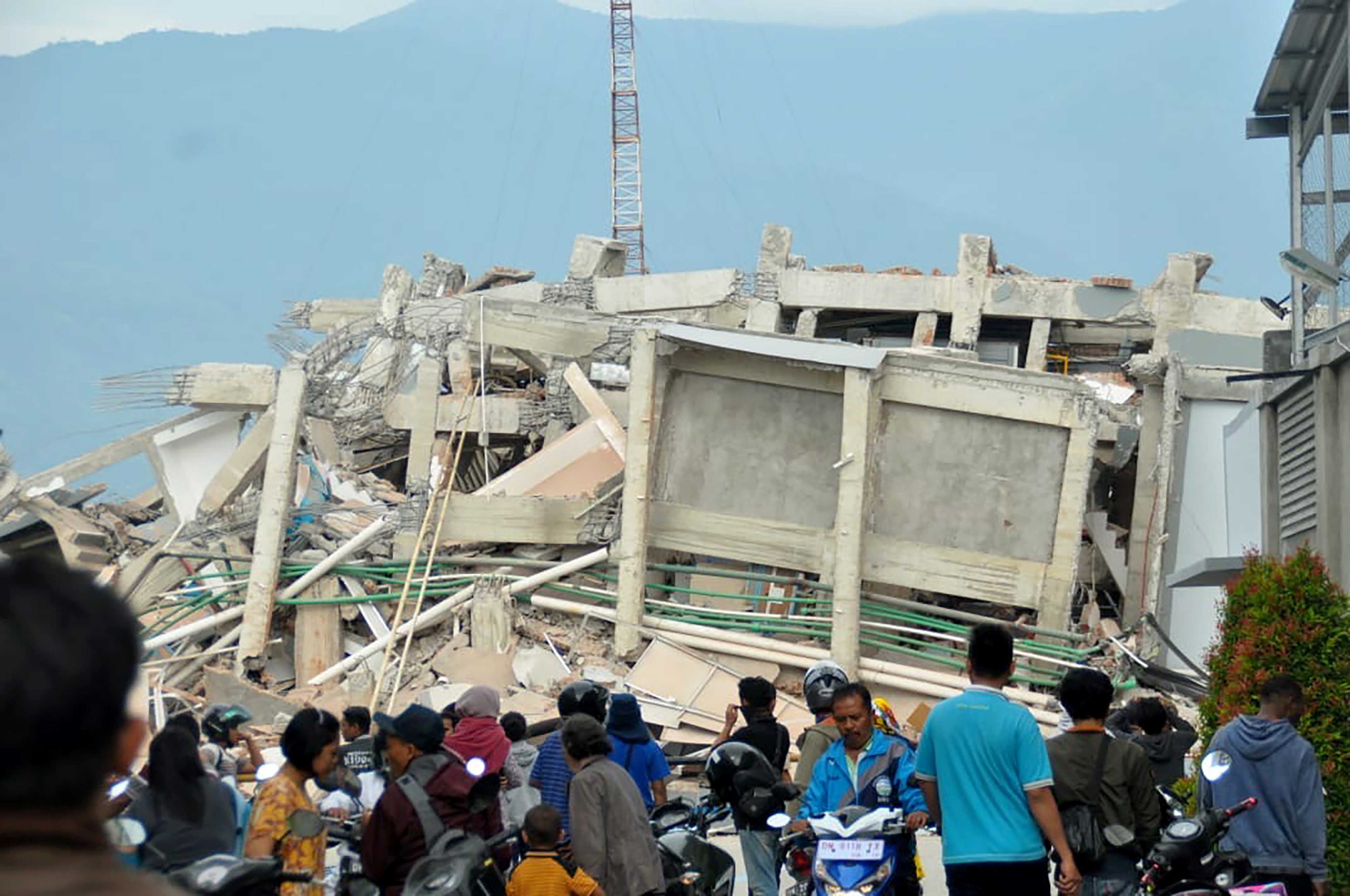 Những căn nhà bị phá hủy trong động đất, sóng thần ở Palu, đảo Sulawesi, Indonesia ngày 29-9-2018.  