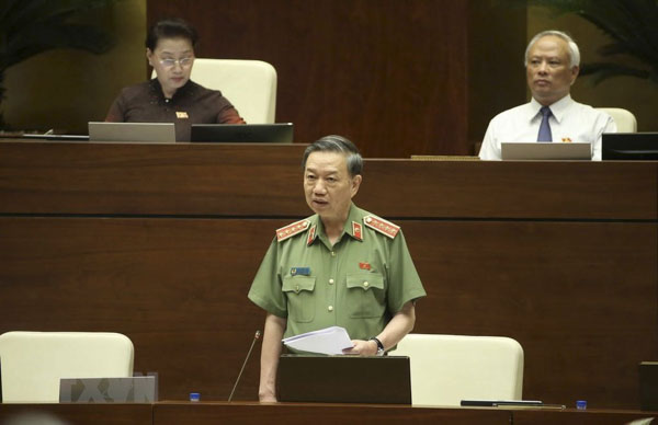 Đại tướng, Bộ trưởng Bộ Công an Tô Lâm trả lời chất vấn. 