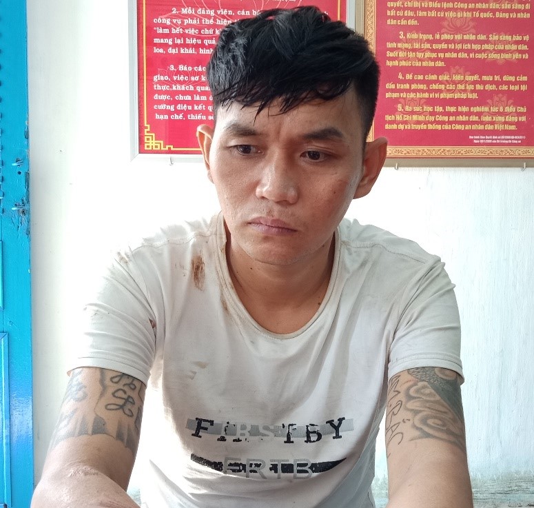 Nguyễn Quang Nhân tại cơ quan Công an.