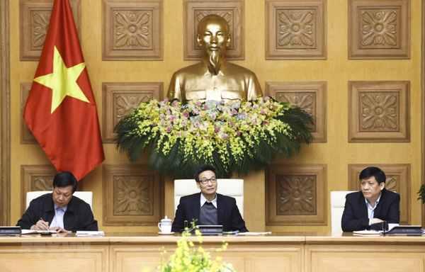Phó Thủ tướng Vũ Đức Đam chủ trì cuộc họp. Ảnh: TTXVN