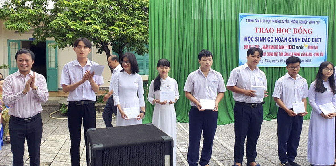 Đại diện HD Bank chi nhánh TP. Vũng Tàu (bìa trái) trao học bổng cho HS.