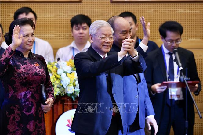 Tổng Bí thư, Chủ tịch nước Nguyễn Phú Trọng, Thủ tướng Nguyễn Xuân Phúc và Chủ tịch Quốc hội Nguyễn Thị Kim Ngân tại Lễ khai mạc. Ảnh: Dương Giang/TTXVN