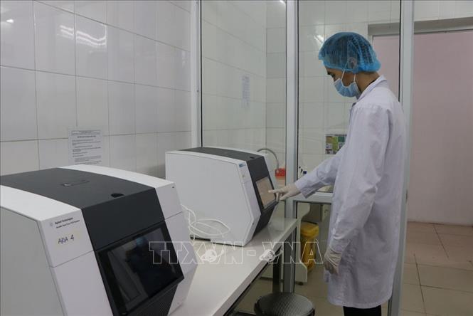  Xét nghiệm sàng lọc người mắc COVID-19. Ảnh: Trung Nguyên Xét nghiệm sàng lọc người mắc COVID-19. Ảnh: Trung Nguyên