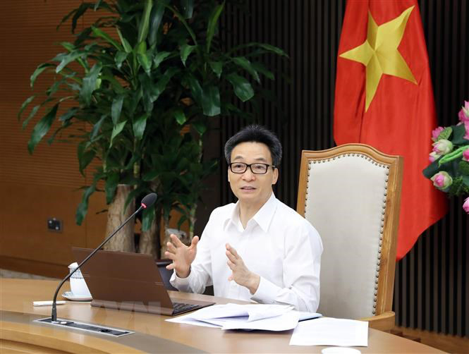 Phó Thủ tướng Chính phủ Vũ Đức Đam, Trưởng BCĐ Quốc gia phòng, chống dịch COVID-19 phát biểu tại cuộc họp.