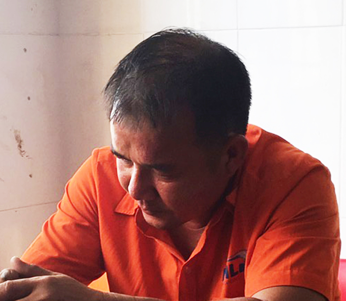Lê Tuấn Hiệp tại cơ quan công an.