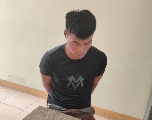 Nghi phạm Liễu tại cơ quan công an