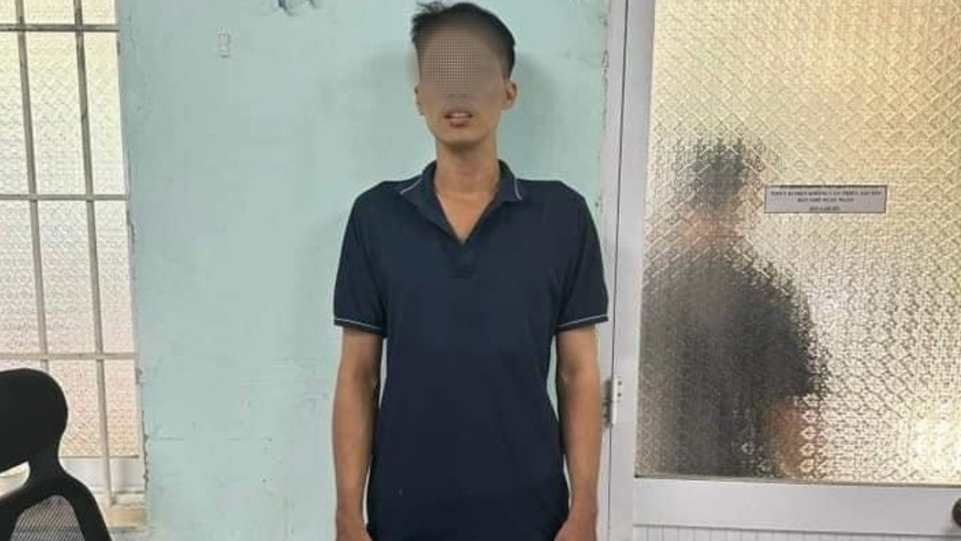 Nghi phạm L.tại cơ quan công an