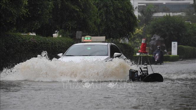 Mưa lớn do ảnh hưởng của bão Trami gây ngập lụt tại tỉnh đảo Hải Nam, Trung Quốc.