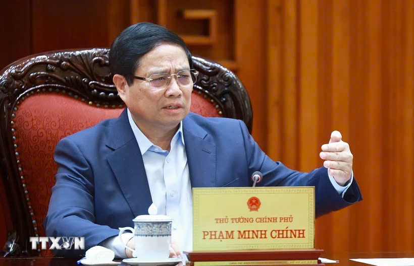Thủ tướng Phạm Minh Chính chủ trì cuộc họp về mức áp thuế mới của Hoa Kỳ đối với hàng hóa nhập khẩu từ Việt Nam. Ảnh: DƯƠNG GIANG